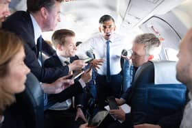 Rishi Sunak talks to journalists on his plane as he travels from Northern Ireland. Photos: Stefan Rousseau/PA Wire