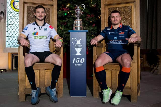 Glasgow Warriors' George Horne (L) and Edinburgh's Ben Vellacott reacquaint themselves with each other at Stirling Castle. (Photo by Ross Parker / SNS Group)