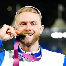 Scotland'sJosh Kerr of Scotland celebrates with his gold medal for the Men's One Mile final at the 2026 Commonwealth Games (Picture: Owen Humphreys/PA Wire)