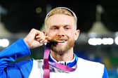 Scotland'sJosh Kerr of Scotland celebrates with his gold medal for the Men's One Mile final at the 2026 Commonwealth Games (Picture: Owen Humphreys/PA Wire)