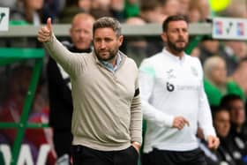 Hibs manager Lee Johnson gives his squad the thumbs up during the 3-1 win over Aberdeen.  (Photo by Mark Scates / SNS Group)