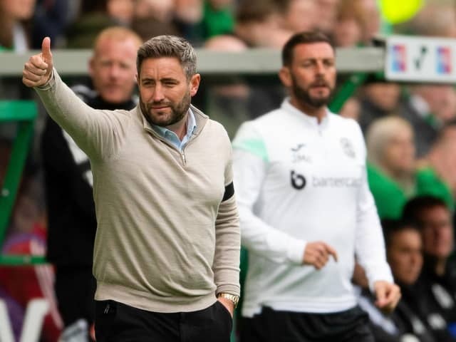 Hibs manager Lee Johnson gives his squad the thumbs up during the 3-1 win over Aberdeen.  (Photo by Mark Scates / SNS Group)