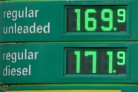 High petrol and diesel prices are displayed on the forecourt of the M62 motorway Birch service station in Brighouse. Picture: Christopher Furlong/Getty Images