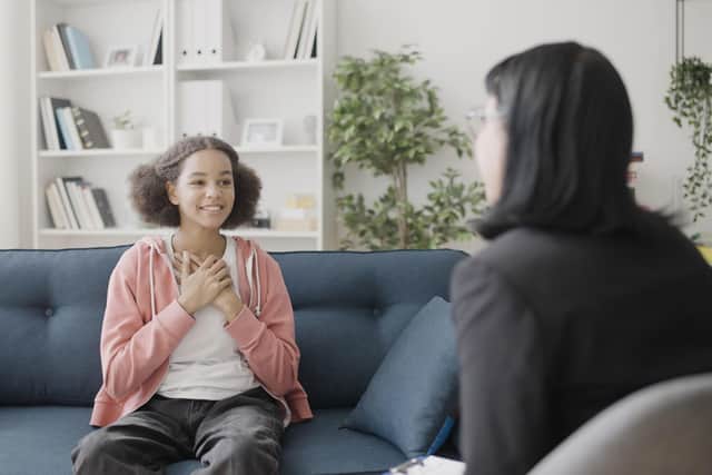 A Safeguarder meeting with a child