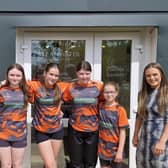 The Hillfoot Vixens are pictured with Allanwater Homes Sales Manager, Lauren McNair.