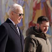 US president Joe Biden (left) walks next to Ukrainian president Volodymyr Zelensky (right) as he arrives for a visit in Kyiv on February. Picture: Dimitar Dilkoff/AFP via Getty Images