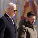 US president Joe Biden (left) walks next to Ukrainian president Volodymyr Zelensky (right) as he arrives for a visit in Kyiv on February. Picture: Dimitar Dilkoff/AFP via Getty Images
