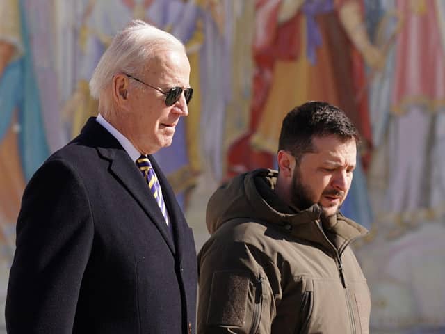 US president Joe Biden (left) walks next to Ukrainian president Volodymyr Zelensky (right) as he arrives for a visit in Kyiv on February. Picture: Dimitar Dilkoff/AFP via Getty Images