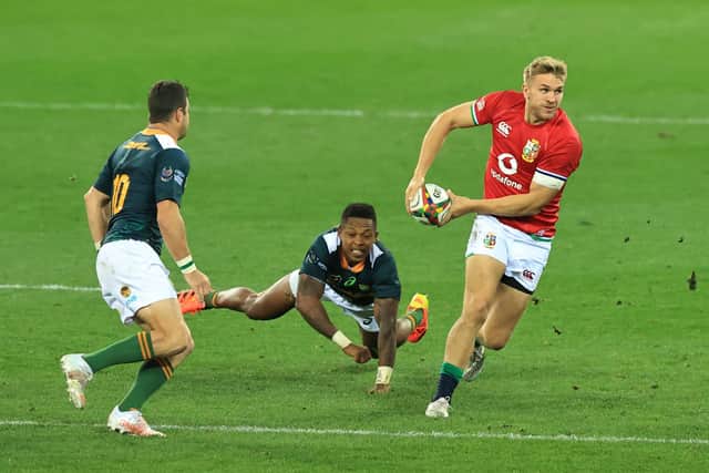 Scotland centre Chris Harris breaks the tackle of South Africa A wing Sbu Nkosi during the Lions defeat at Cape Town Stadium. Picture: David Rogers/Getty Images