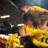 St Johnstone celebrate their victory at East End Park.