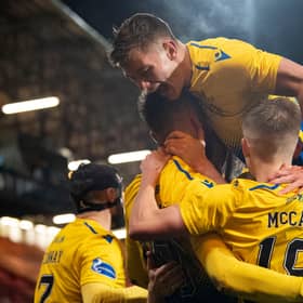 St Johnstone celebrate their victory at East End Park.