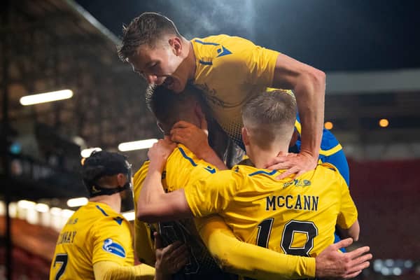 St Johnstone celebrate their victory at East End Park.
