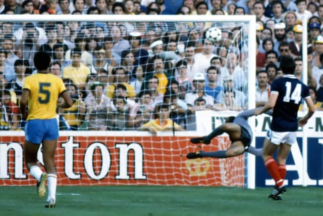 Scotland's Dave Narey (right) opens the scoring against Brazil at the 1982 World Cup in Seville.