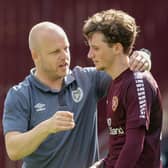 Hearts technical director Steven Naismith with Rangers loannee Alex Lowry at full time after the 4-0 win over Partick Thistle. (Photo by Mark Scates / SNS Group)