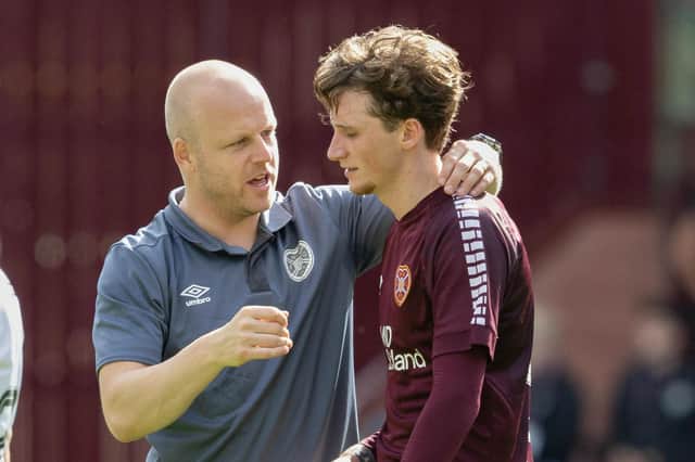 Hearts technical director Steven Naismith with Rangers loannee Alex Lowry at full time after the 4-0 win over Partick Thistle. (Photo by Mark Scates / SNS Group)