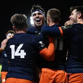 Stuart McInally celebrates with Freddie Owsley during Edinburgh's 66-3 Challenge Cup win over CA Brive. (Photo by Paul Devlin / SNS Group)