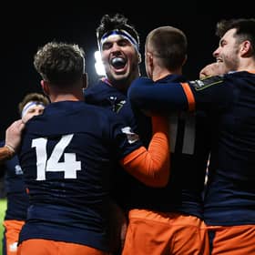 Stuart McInally celebrates with Freddie Owsley during Edinburgh's 66-3 Challenge Cup win over CA Brive. (Photo by Paul Devlin / SNS Group)