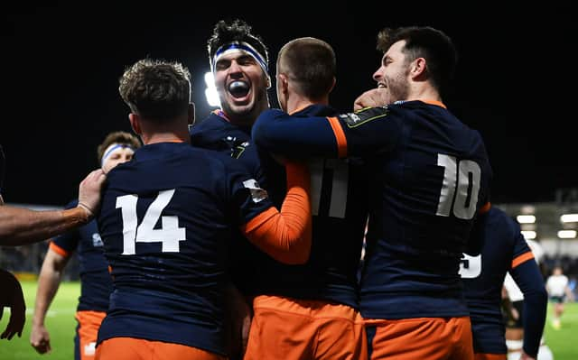 Stuart McInally celebrates with Freddie Owsley during Edinburgh's 66-3 Challenge Cup win over CA Brive. (Photo by Paul Devlin / SNS Group)