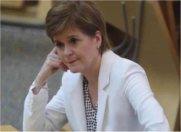 The First Minister faced "reasonable and serious" questions about the discharge of elderly Covid-19 patients from hospitals into care homes. PIC: Getty.