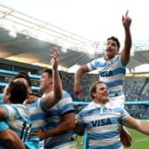 Argentina celebrate after their stunning win over New Zealand. Picture: Cameron Spencer/Getty Images
