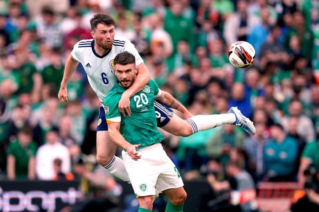 Republic of Ireland's Scott Hogan battles for possession of the ball with Scotland's John Souttar, (left) during the UEFA Nations League match at the Aviva Stadium, Dublin.
