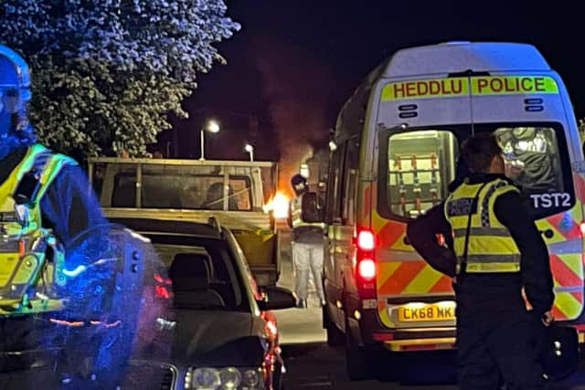 Police officers on Howell Road in Cardiff (Photo: Bronwen Weatherby/PA Wire)