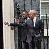 Former US president Barack Obama (right) leaves following a meeting at 10 Downing Street in London. Picture: Stefan Rousseau/PA Wire