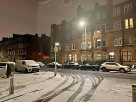 Snow covers the cars and roads in a residential area of Glasgow. Snow and ice have swept across parts of the UK, with cold wintry conditions set to continue for days. Picture date: Friday December 16, 2022.