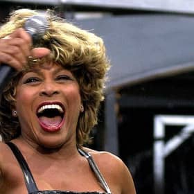 Tina Turner performing on stage at London’s Wembley Stadium in July 2000 (Picture: Michael Stephens/PA Wire)