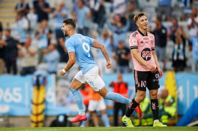 Malmo's Croatian forward Antonio Colak celebrates during the UEFA Champions League qualifying match between Malmo and HJK Helsinki (Photo by ANDERS BJURO/TT News Agency/AFP via Getty Images)