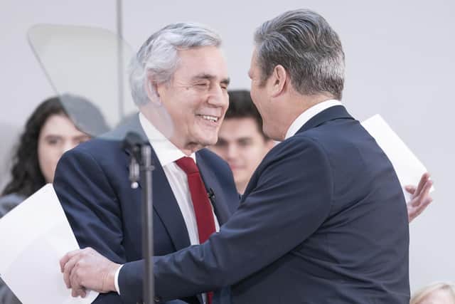 Labour leader Sir Keir Starmer (right) and former Prime Minister Gordon Brown greet each other during a Labour Party press conference at Nexus, University of Leeds, in Yorkshire, to launch a report on constitutional change and political reform that would spread power, wealth and opportunity across the UK. Picture date: Monday December 5, 2022.