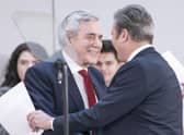 Labour leader Sir Keir Starmer (right) and former Prime Minister Gordon Brown greet each other during a Labour Party press conference at Nexus, University of Leeds, in Yorkshire, to launch a report on constitutional change and political reform that would spread power, wealth and opportunity across the UK. Picture date: Monday December 5, 2022.