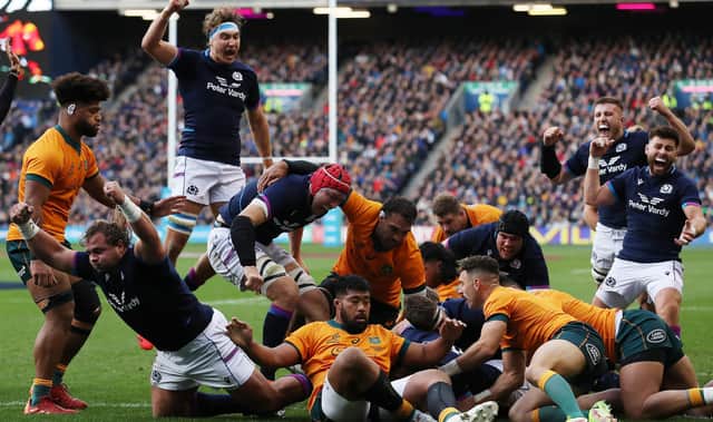 Hamish Watson is buried beneath the bodies as he goes over to score Scotland's first try against Australia. (Photo by Ian MacNicol/Getty Images)