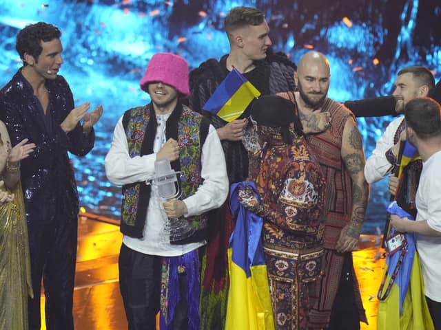 Kalush Orchestra from Ukraine celebrates after winning the Grand Final of the Eurovision Song Contest at Palaolimpico arena, in Turin, Italy, Saturday, May 14, 2022. (AP Photo/Luca Bruno)