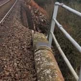 Damage beside the track on right