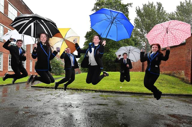 6th year students at Lourdes Secondary School, Josef Sheidiq, Amy Patterson, Morgan Grant, Laura Stewart, Josh Traynor and Weronika Glazreceive their exam resulys by text to their mobile phone yesterday.