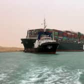 The Taiwan-owned MV Ever Given, a 400-metre- (1,300-foot-)long and 59-metre wide vessel, lodged sideways and impeding all traffic across the waterway of Egypt's Suez Canal.  (Photo: AFP via Getty Images)
