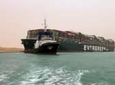 The Taiwan-owned MV Ever Given, a 400-metre- (1,300-foot-)long and 59-metre wide vessel, lodged sideways and impeding all traffic across the waterway of Egypt's Suez Canal.  (Photo: AFP via Getty Images)