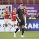 Dundee United defender Liam Smith looks to the heavens after the 7-0 thrashing by AZ Alkmaar.