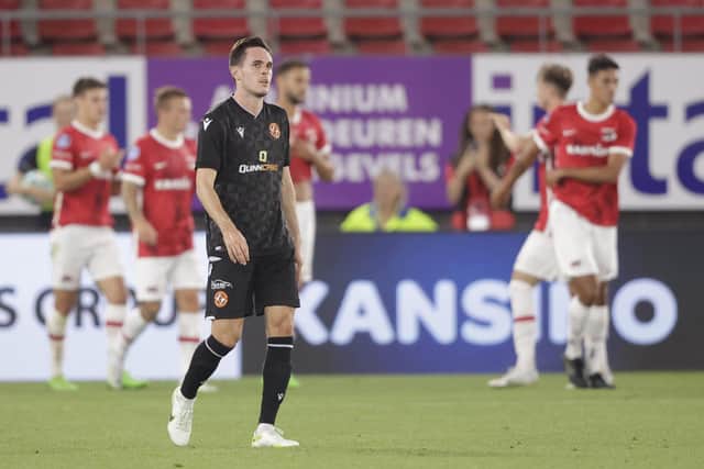 Dundee United defender Liam Smith looks to the heavens after the 7-0 thrashing by AZ Alkmaar.