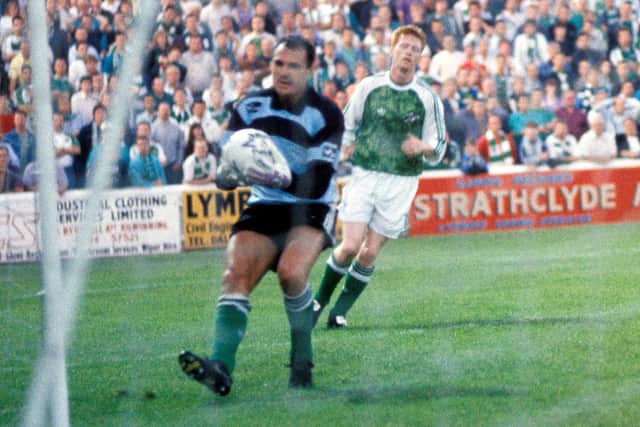 Hibs goalkeeper John Burridge (left) in action as teammate Graham Mitchell covers in the Skol Cup quarter-final win at Ayr United in 1991