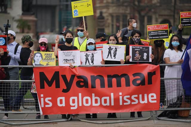Protesters gathered outside the Houses of Parliament in Westminster, central London, demonstrating against the February 1 coup in Myanmar which ousted Aung San Suu Kyi's elected government. Picture date: Wednesday March 31, 2021.
