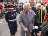 King Charles III reacts after an egg was thrown his direction as he arrived for a ceremony at Micklegate Bar in York
