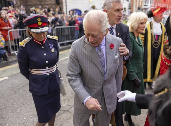 King Charles III reacts after an egg was thrown his direction as he arrived for a ceremony at Micklegate Bar in York
