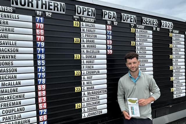 Englishman Haydn McCullen shows off his card after signing for a 59 in the first round of the Northern Open at Moray Golf Club in Lossiemouth