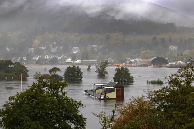 Extreme weather, such as the major floods in October, pictured at Kingussie, is a growing problem (Picture: Jeff J Mitchell/Getty Images)