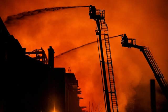 Firefighters tackle the blaze at the Glasgow School of Art's Mackintosh building in 2018. Picture: John Devlin