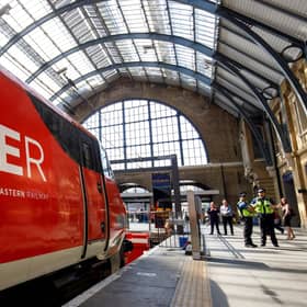 A London North Eastern Railway (LNER) train is pictured at King's Cross rail station in London. Picture: Tolga Akmen/AFP/Getty Images