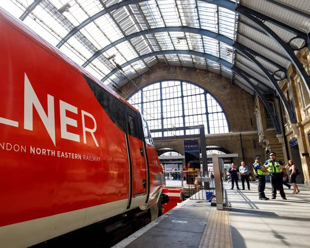 A London North Eastern Railway (LNER) train is pictured at King's Cross rail station in London. Picture: Tolga Akmen/AFP/Getty Images