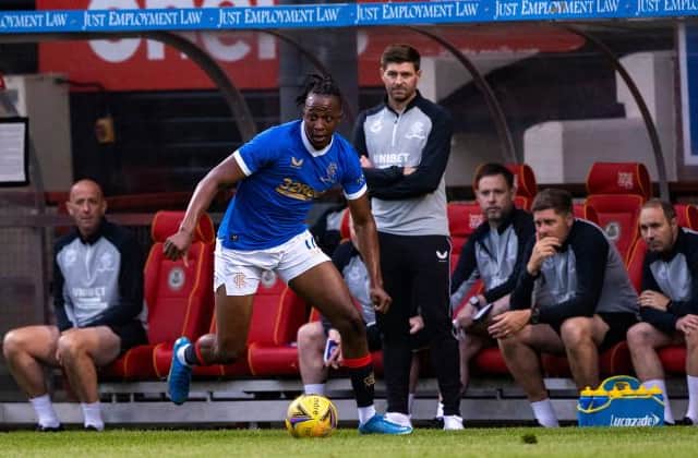 Joe Aribo in full flow for Rangers in their opening pre-season friendly against Partick Thistle at Firhill as manager Steven Gerrard looks on. (Photo by Craig Williamson / SNS Group)